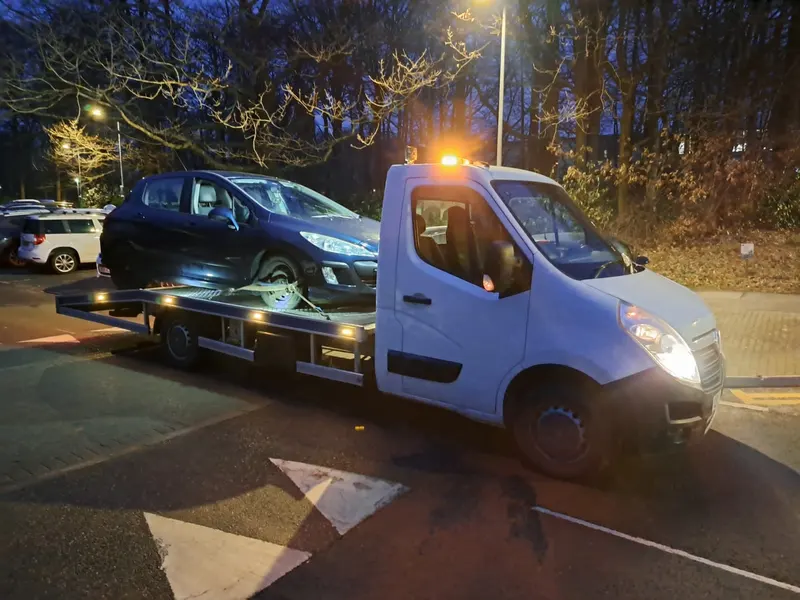 Non-running car collected in the evening near Bowness